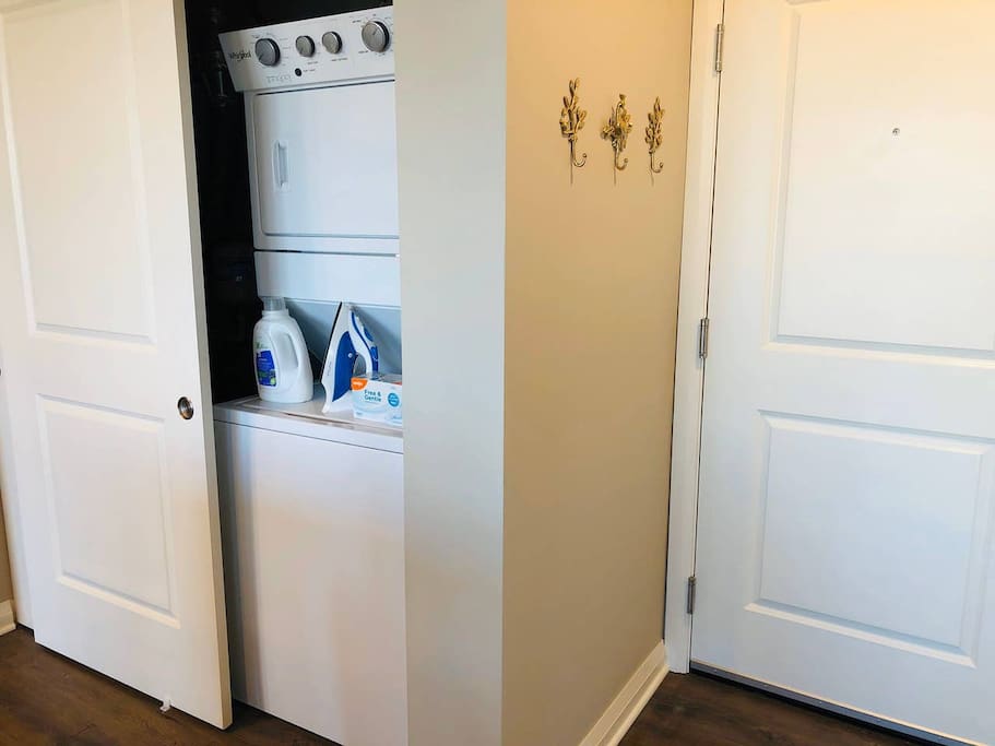 Washer and dryer in a furnished apartment in downtown columbus