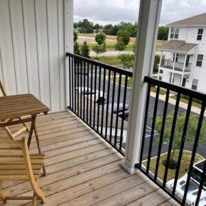 A balcony with chairs in a furnished apartment in Hilliard Ohio