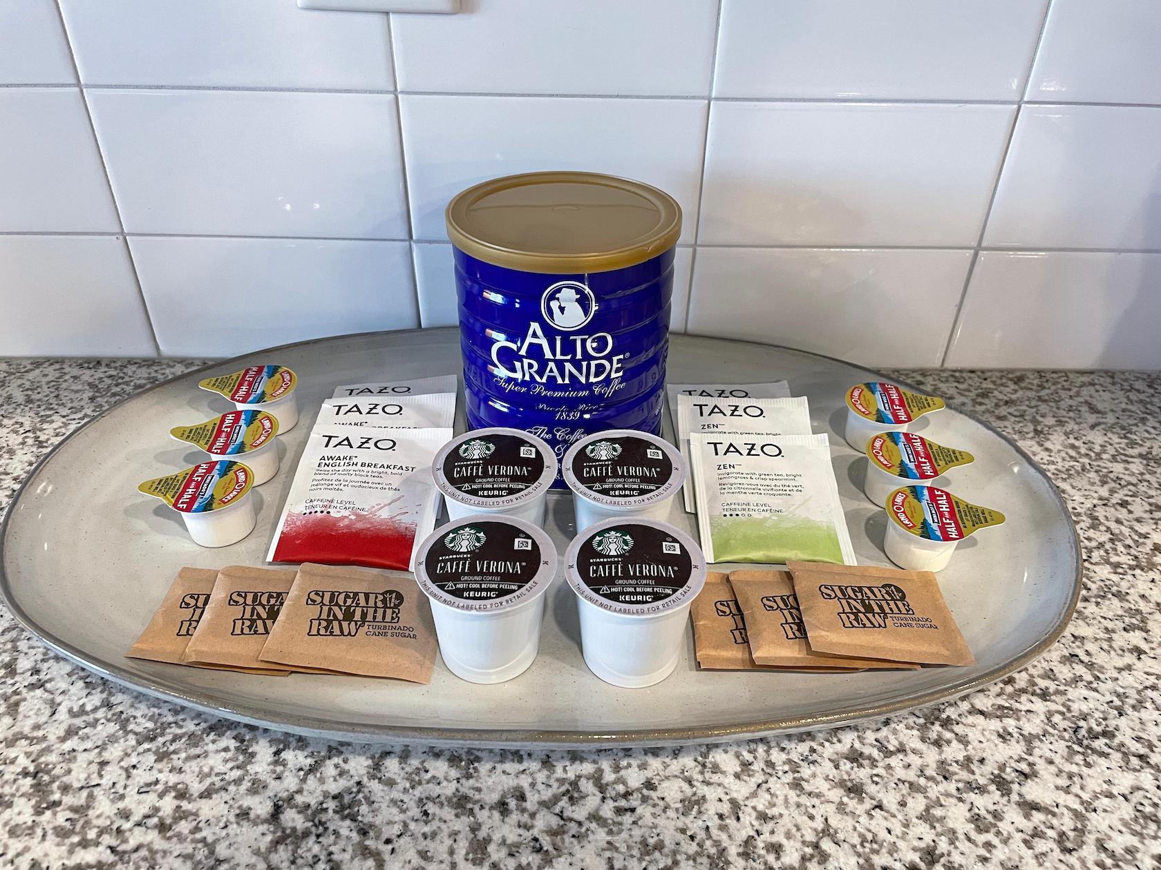 Alto Grande coffee, K-Cups, and tea bags on the kitchen counter of a furnished apartment near Ohio State