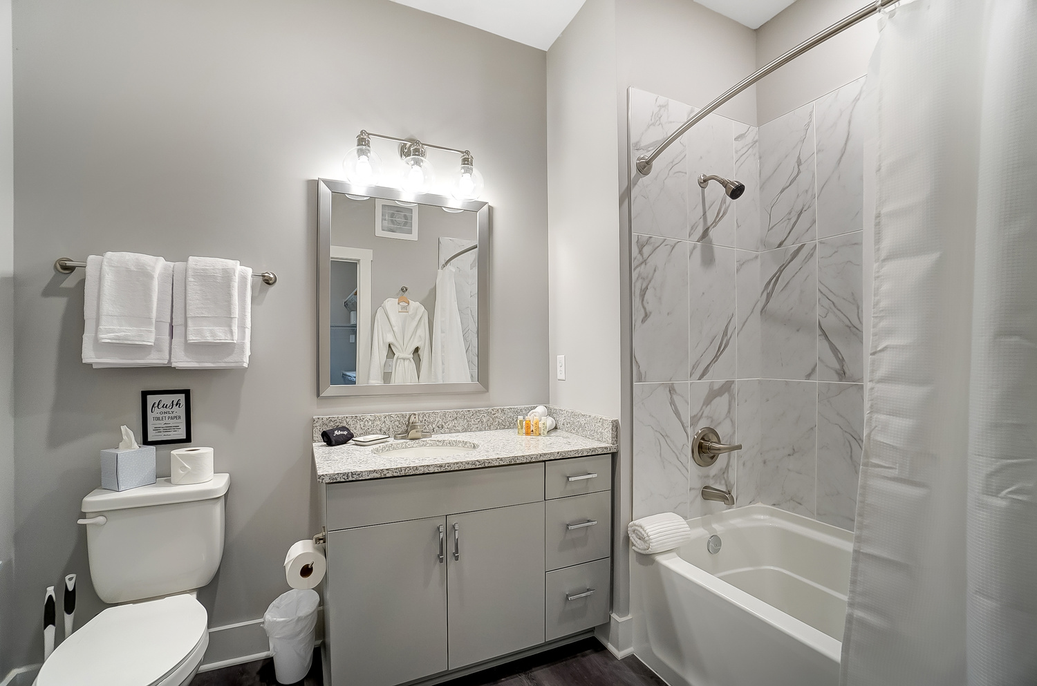 Clean bathroom with white towels in a furnished apartment near OSU