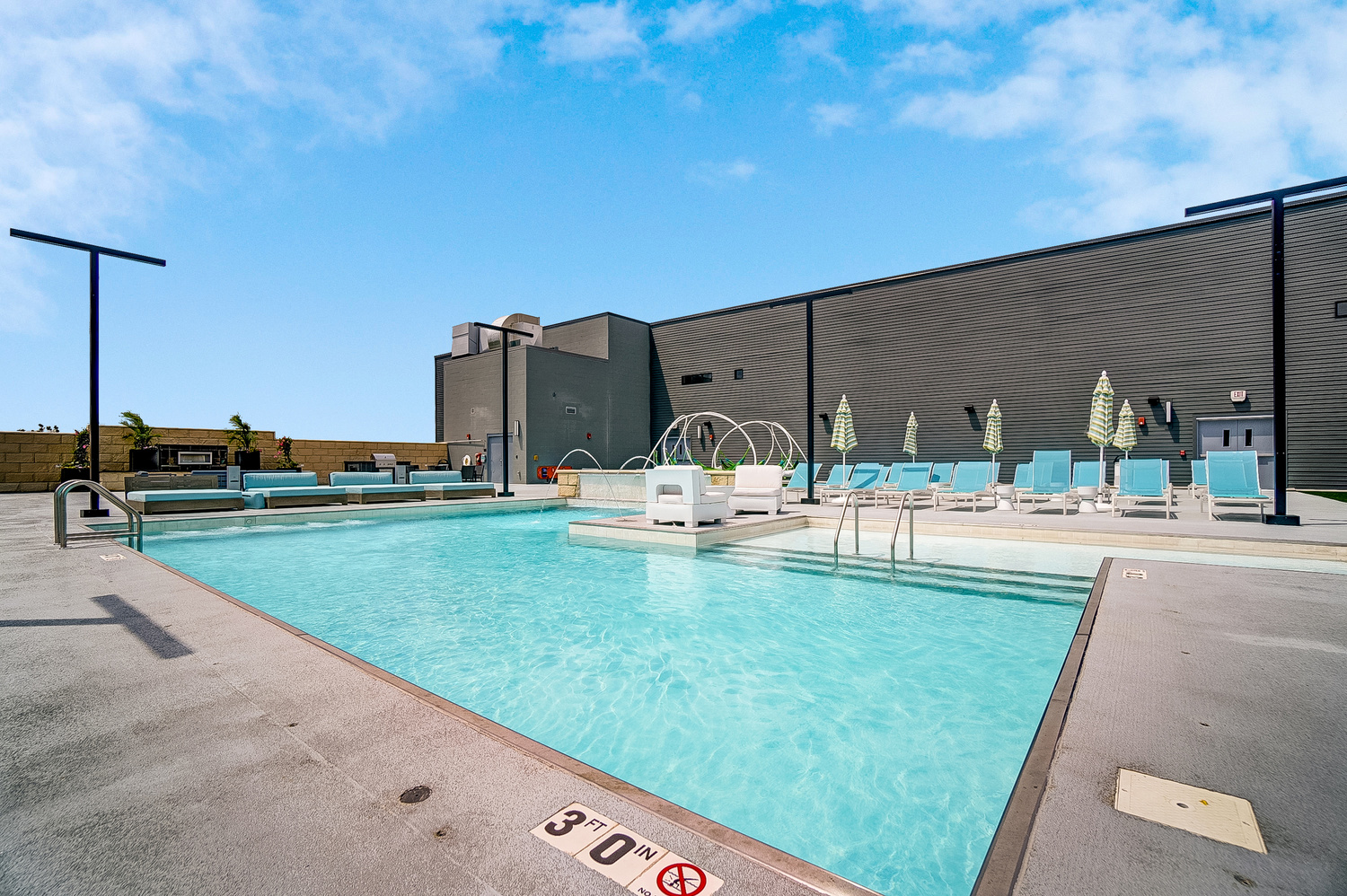 The clubhouse pool in the community of a furnished apartment near OSU