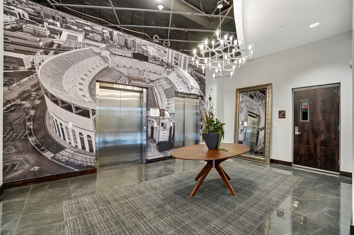 The lobby elevators in the community of a furnished apartment near OSU