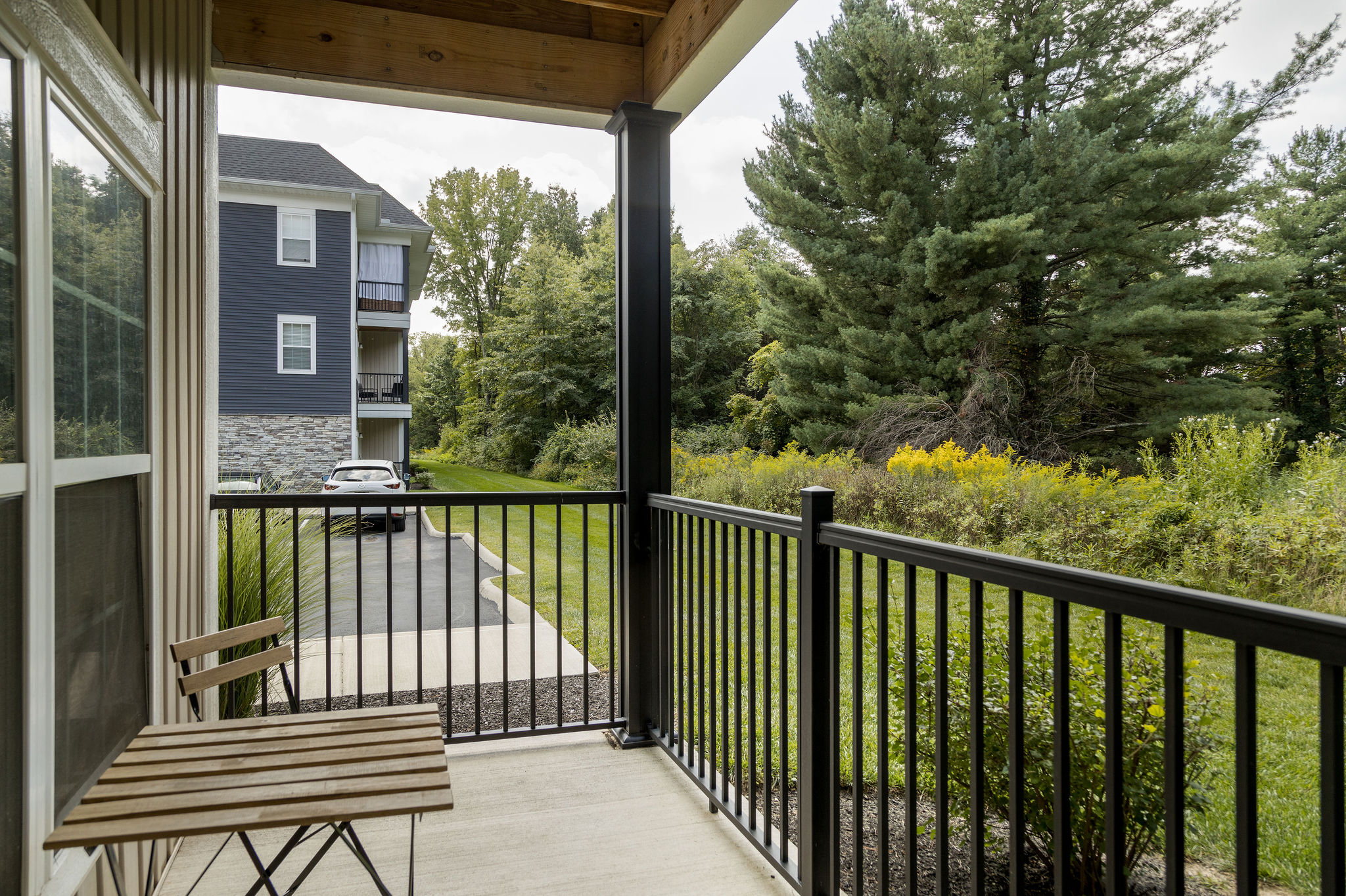 Patio with chairs and a table in a furnished apartment near New Albany Ohio