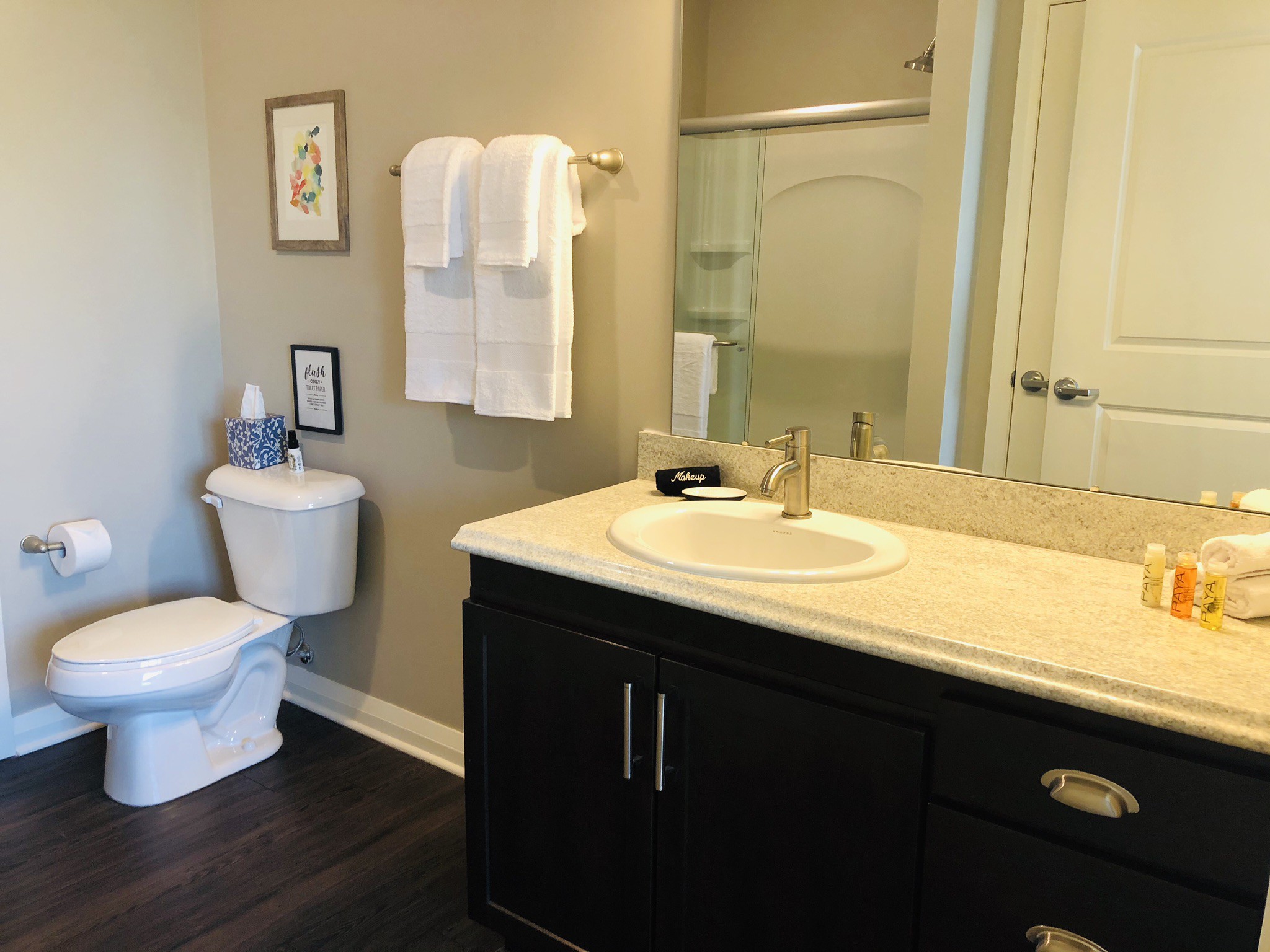 Walk-in shower in the guest bathroom of a furnished apartment in Westerville Ohio