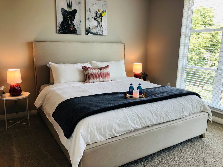 King bed in a furnished apartment in Downtown Columbus