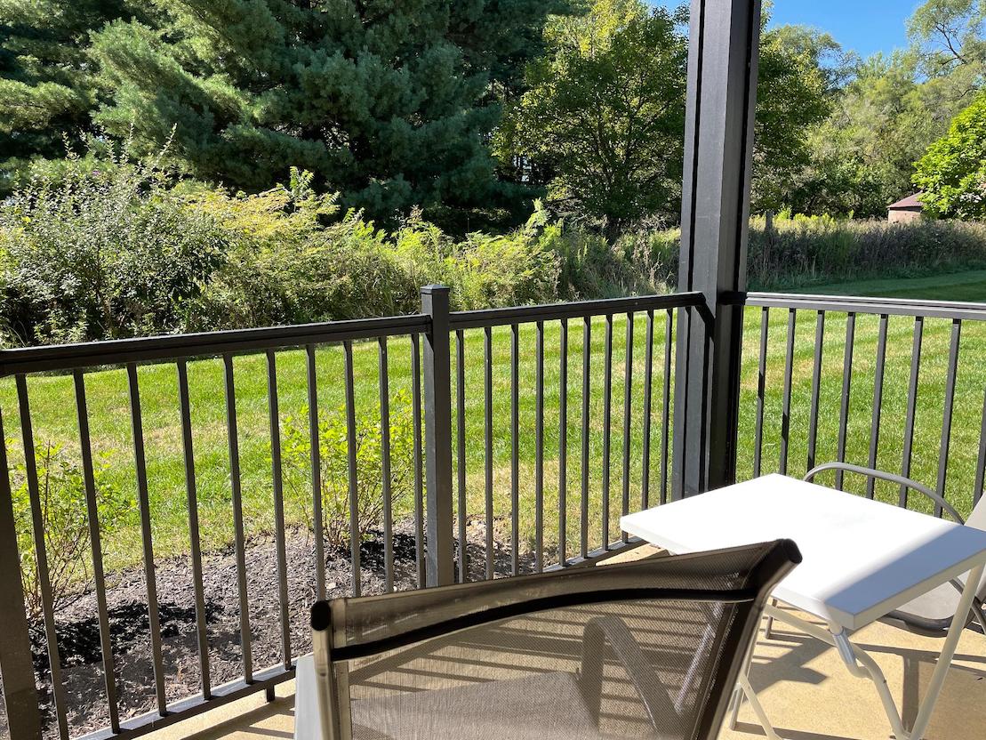 Patio with chairs and a table in a furnished apartment near New Albany Ohio