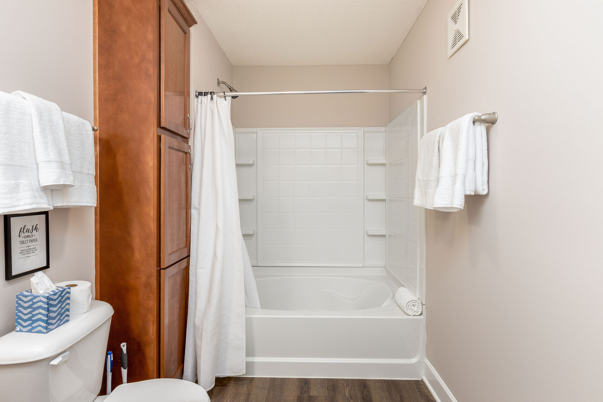 A shower and bath tub in a furnished apartment in Westerville Ohio