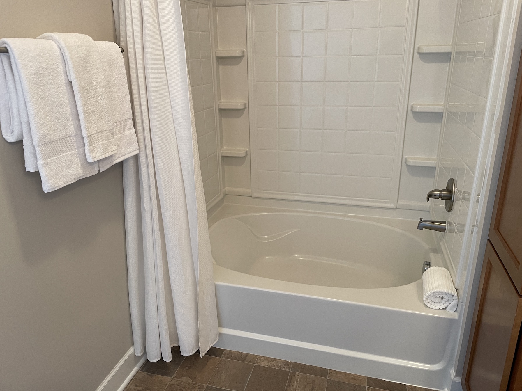 A shower and bath tub in a furnished apartment in Westerville Ohio