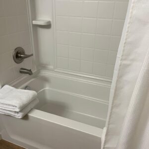 A shower and bath tub in a furnished apartment in Hilliard Ohio