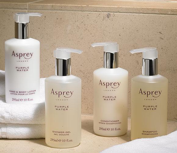 Bottles of Asprey toiletries provided in a furnished apartment in Dublin Ohio