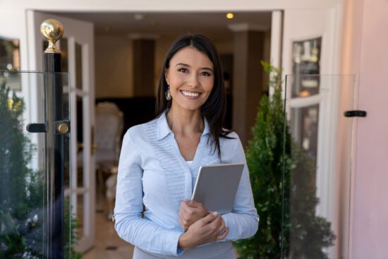 Primary Photo Of Happy Hospitality Manager Who Exemplifies Authentic Hospitality. og-image