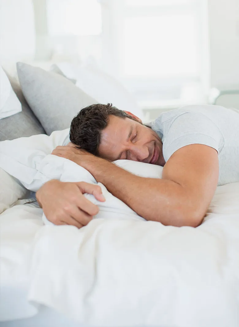 man holding comfortable pillow